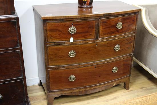 A bow front chest of two short and two long drawers, W.94cm